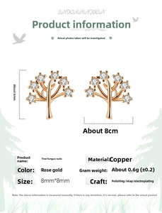 Detailed view of rose gold tree earrings with white zircon accents and size dimensions