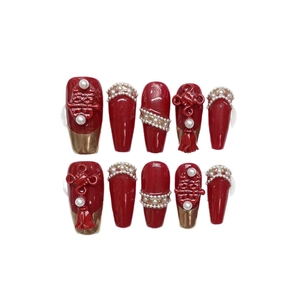 Chinese wedding style press-on nails with red 3D relief Xi character and gold French tips