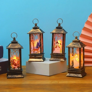 Set of 4 Christmas LED lanterns with Santa and Reindeer motifs in antique bronze finish