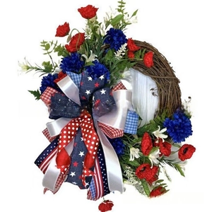 Patriotic USA Independence Day wreath with red white blue flowers and burlap bow