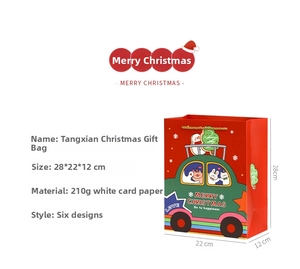 Detailed view of red Christmas gift bag showing dimensions 28x22x12cm and paper material