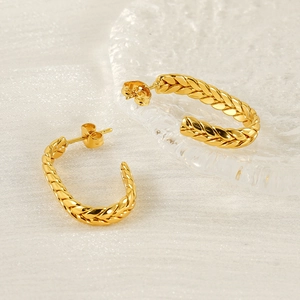 Elegant gold vintage braided C-shaped hoop earrings with polished twisted texture