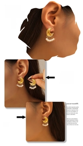 Three-view montage of model wearing gold moon and star tassel earrings with faux pearls