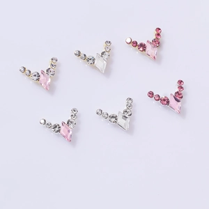 Elegant V-shaped nail art charms with pink and clear diamond rhinestones on alloy base