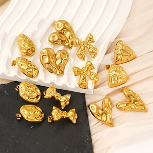 Lava texture heart and bow knot stud earrings set in 18k gold plated stainless steel