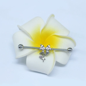 Silver industrial barbell earring with butterfly detail and heart star charms
