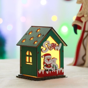Christmas glowing wooden house with Snow lettering and warm lights for festive decoration