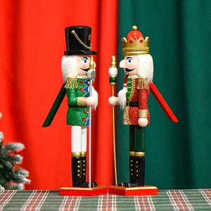 Set of two 38cm glittery wooden nutcracker soldier figures for Christmas decoration