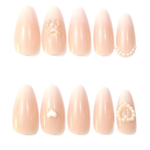 Pink gradient almond press-on nails with 3D bears, pearls, and heart decorations