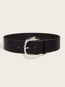 Detail of the black leather wide belt with a polished silver semi-oval metal buckle