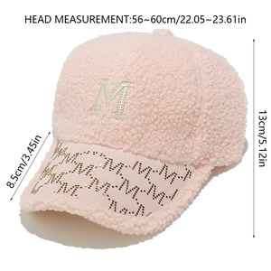 Pink fleece baseball cap with M embroidery and rhinestone patterns showing dimensions