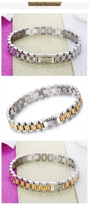 Detail of silver and gold stainless steel watch-style bracelets with folding clasps