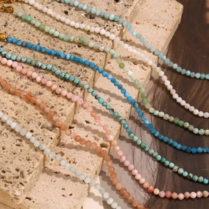 Detailed view of colorful natural stone beads with 18K gold-plated stainless steel clasp