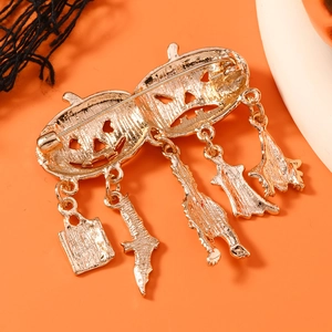 Halloween pumpkin brooch in gold alloy with festive pendants and pin back for women