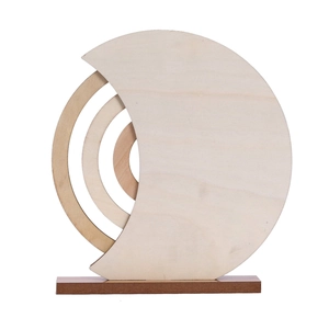 Macro shot of semi-circular wooden calendar base with natural concentric wood grain texture