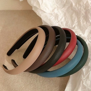 Minimalist leather padded headbands in various vintage colors with matte finish for women