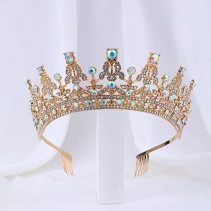 Detailed side view of golden bridal crown with iridescent rhinestones and hair combs