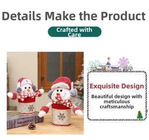 Close-up of snowman Christmas gift tins with red velvet hats and plaid scarves