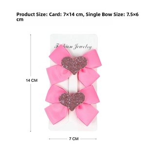 Pink ribbon hair bows with glitter hearts detail including dimensions on display card