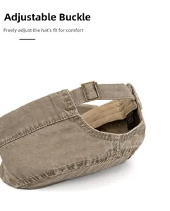 Detail of adjustable metal buckle and stitching on washed cotton flat top military hat