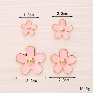 Pink enamel flower charms in four sizes for DIY jewelry and phone case decoration