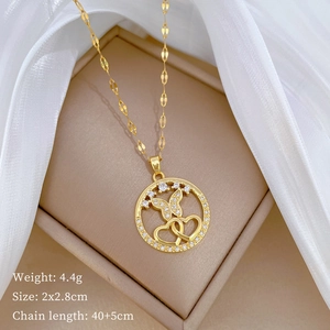 Detail of gold necklace with butterfly heart pendant and dimensions 40cm plus 5cm chain