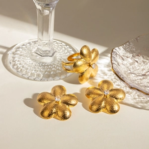 18k gold plated stainless steel flower jewelry set with crystals and brushed finish