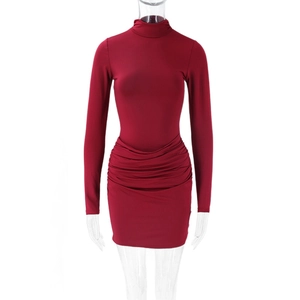 Detailed view of ruched burgundy slim fit dress with stand collar and long sleeves