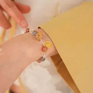 Colorful moonstone and sunstone beaded bracelet with golden vintage floral charms for women