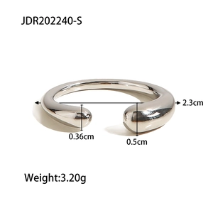 Macro detail of oval titanium steel open ring showing polished surface and 3.20g weight