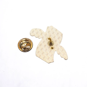 Detailed back view of gold dollar brooch featuring metal pins and butterfly clutch closure