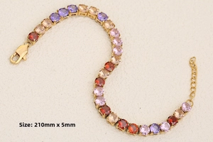 Macro detail of 18K gold-plated tennis bracelet with multi-color stones, 210mm x 5mm size
