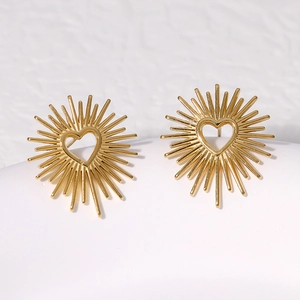 Golden sunburst heart earrings in titanium steel with radiant textured metal finish