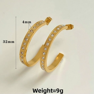 Detail view of 32mm gold C-shaped earrings with rhinestones and dimensions displayed