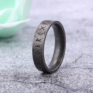 Vintage stainless steel Viking rune ring with distressed grey finish and Norse engravings