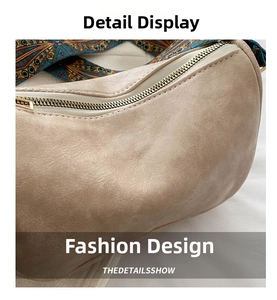 Detailed close-up of khaki faux leather texture with bohemian patterned wide strap