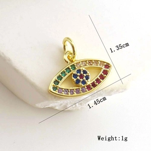 Detailed view of evil eye pendant with dimensions 1.35cm height and colorful zircons