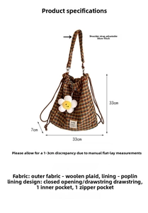 Detailed product size chart for wool plaid drawstring bucket bag with floral charm