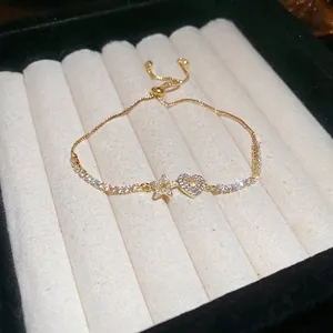Gold-plated star and heart bracelet with cubic zirconia paving and adjustable slider clasp
