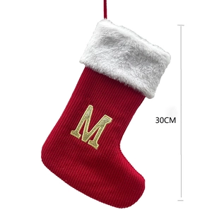 Red knitted Christmas stocking with plush cuff and gold embroidered letter M 30CM size
