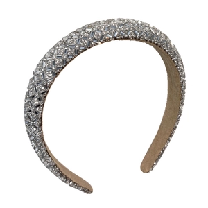Sparkling silver headband with dense rhinestones for a high top french elegant hair style