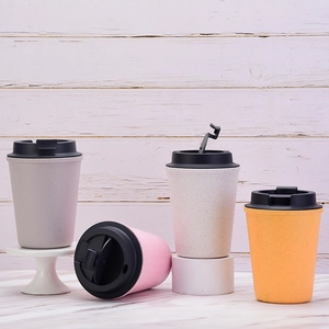 Group display of eco-friendly wheat straw coffee cups in four assorted colors with lids