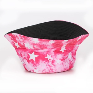 Detail of pink tie-dye bucket hat with star print and reinforced stitched brim