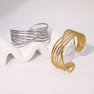 Minimalist geometric multi-layer crossed stainless steel open cuff bracelet in gold and silver