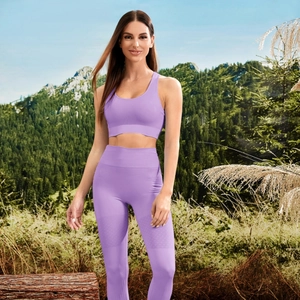 Women's lavender two-piece yoga set with seamless high-waist leggings and sports bra