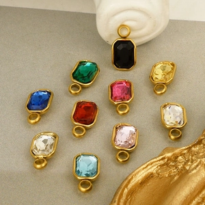 Set of nine colorful square glass gemstone pendants in gold-plated stainless steel frames