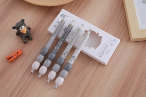 Detail of the soft ergonomic grip and cute cartoon illustrations on the gel pen set