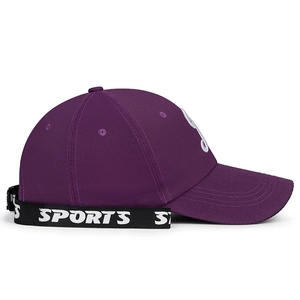 Purple cotton baseball cap with sports strap and white letter embroidery shown at 45-degree angle