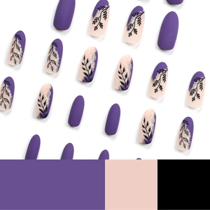 Purple matte press-on nails with nude accents, leaf patterns, and silver glitter detail