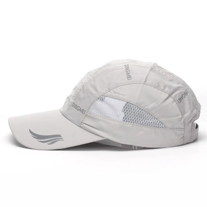 Detail of grey quick-dry baseball cap featuring breathable mesh and side logo print